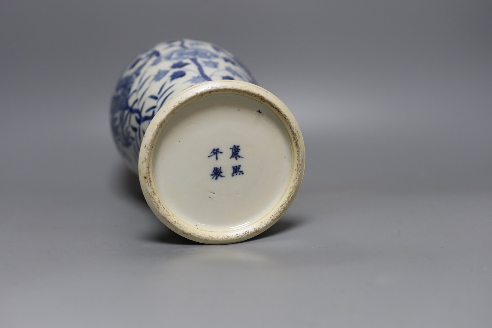 A Chinese blue and white ‘dragon’ vase. Kangxi mark but later, 31cm